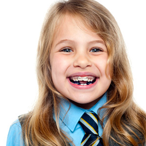 smiling child with braces